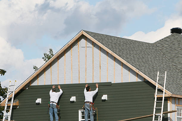 Professional Siding Installation technician working in Goldsboro, NC